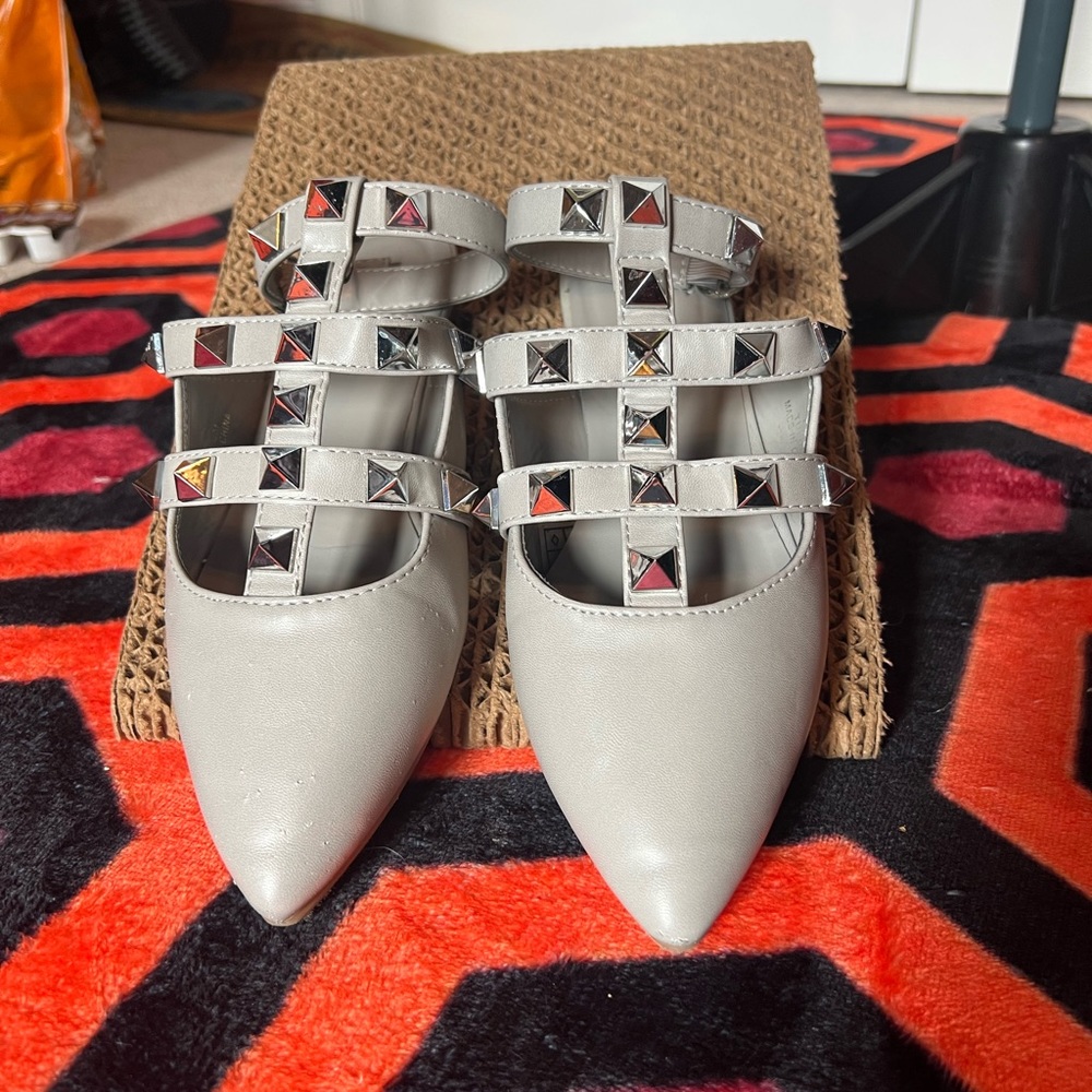 Grey pointed toe studded mules